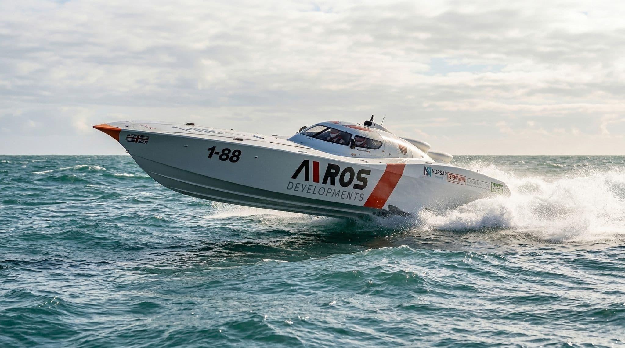 An Airos offshore powerboat racing through spray